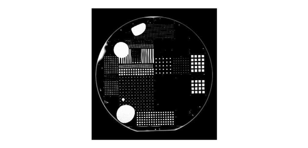 CSAM image of bonded wafer highlighting voids and delamination defects using scanning acoustic microscopy analysis